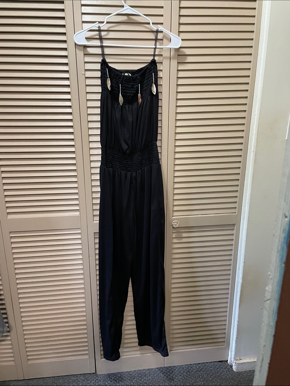 Sleeveless Black Smocked Jumpsuit
